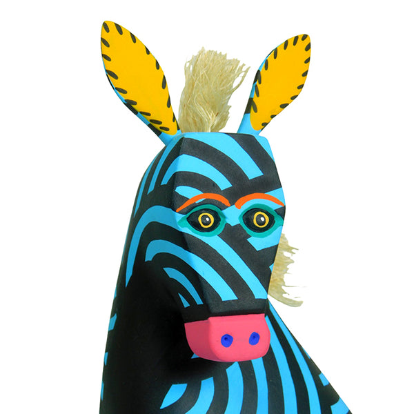 Oaxaca woodcarving alebrije featuring a blue zebra