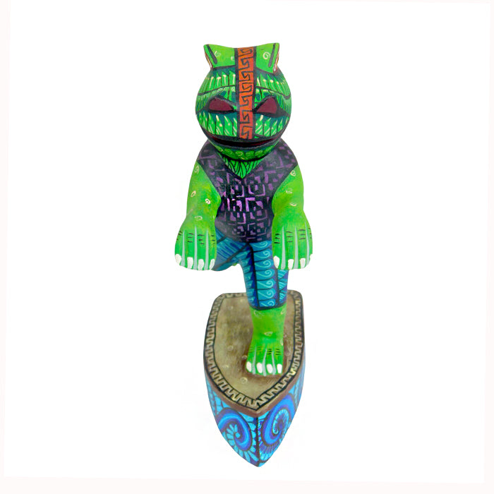 Socorro Roque: Surfer Frog Woodcarving